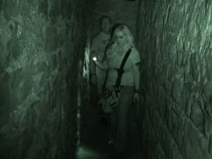 Chad & Staci Morin, Co-Owners of Ghost Hunt Weekends exploring hidden tunnels at a reported haunted location.